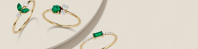 Peora green emerald and diamond bands