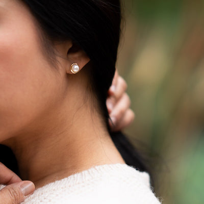 Freshwater Cultured White Pearl Stud Earrings In 14K Yellow Gold Round Button Shape 7Mm Swirl Solitaire E19278 additional view, angle, and on model