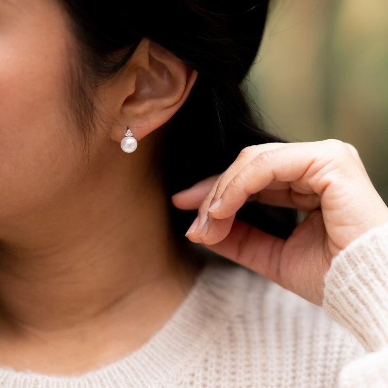 Freshwater Cultured White Pearl Stud Earrings In 14K Yellow Gold Round Button Shape 8Mm Heirloom Solitaire E19282 additional view, angle, and on model