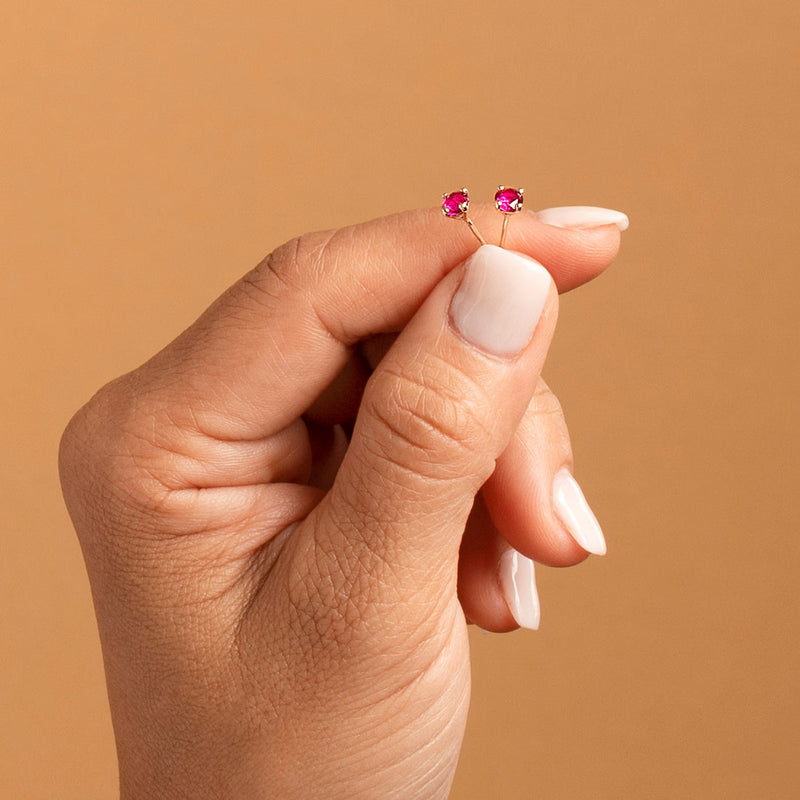 4mm Round Created Ruby Solitaire Stud Earrings in 14K White Gold