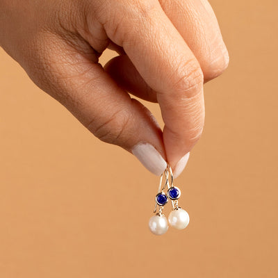 8mm Freshwater Cultured White Pearl and Created Blue Sapphire Earrings in 14K Yellow Gold