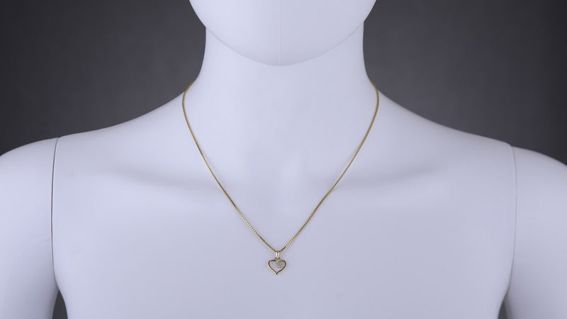 14K Yellow Gold Diamond Accent Dainty Heart Pendant P10088 on a model