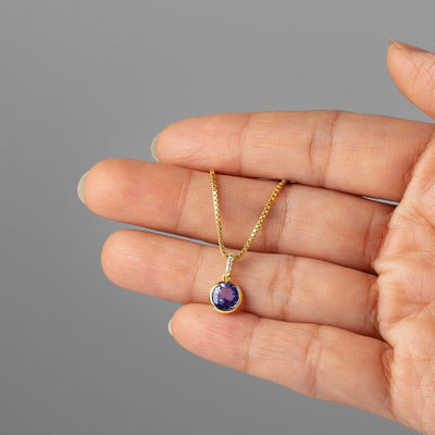 genuine tanzanite 14k yellow gold pendant with diamonds