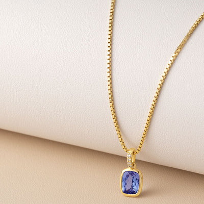 genuine tanzanite 14k yellow gold pendant with diamonds