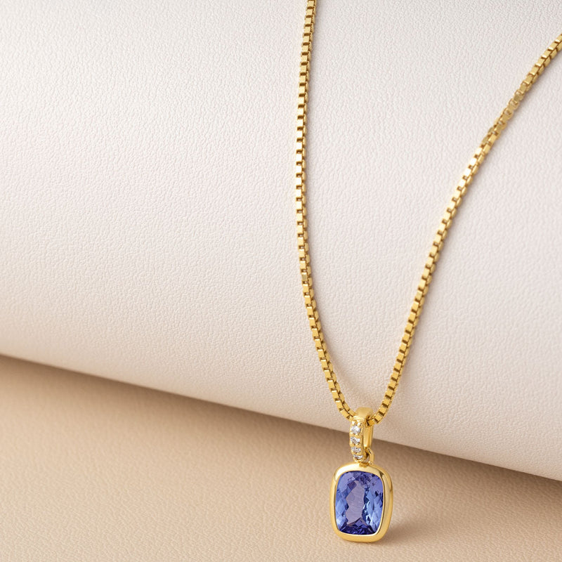 genuine tanzanite 14k yellow gold pendant with diamonds