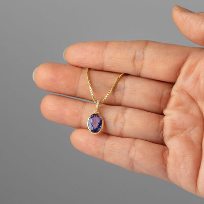 genuine tanzanite 14k yellow gold pendant with diamonds