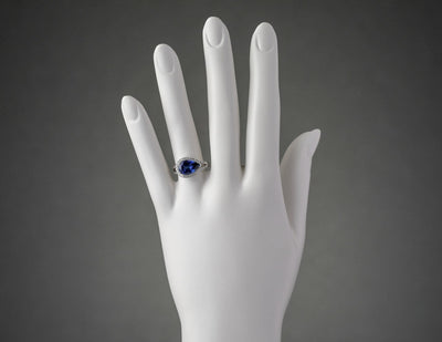 14K White Gold Created Sapphire And Lab Grown Diamond Ring 4 27 Carats Total Pear Shape R63122 on a model