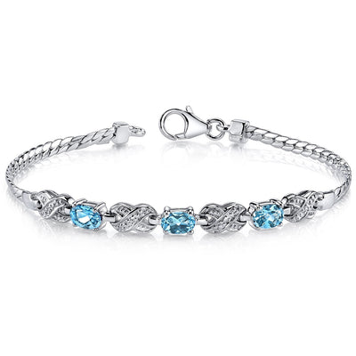 Swiss Blue Topaz Infinity Bracelet Sterling Silver Oval Cut 1.75 Carats