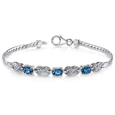 London Blue Topaz Infinity Bracelet Sterling Silver Oval Cut 1.75 Carats