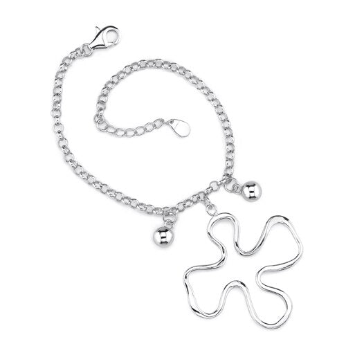 Sterling Silver Rolo Chain Bracelet with a Jigsaw Puzzle Charm Sb3288