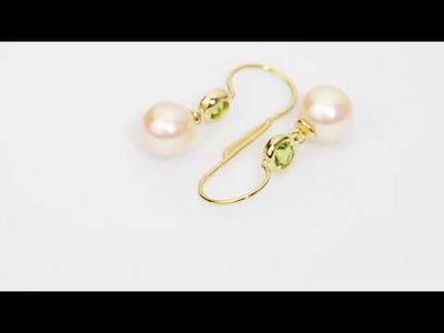 Video of 8mm Freshwater Cultured White Pearl and Peridot Fish Hook Earrings in 14K Yellow Gold.  Includes a Peora gift box. Free shipping, 45-day returns, authenticity guaranteed. E19366