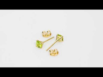 Video of 4mm Round Peridot Solitaire Stud Earrings in 14K Yellow Gold.  Includes a Peora gift box. Free shipping, 45-day returns, authenticity guaranteed. E19342