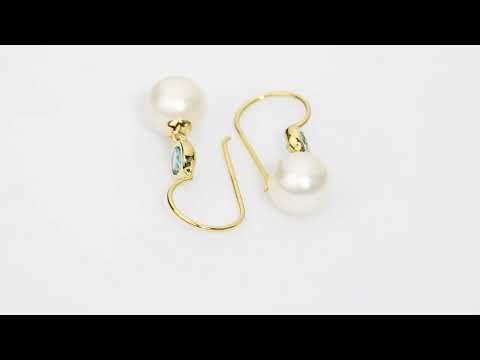 Video of 8mm Freshwater Cultured White Pearl and Swiss Blue Topaz Fish Hook Earrings in 14K Yellow Gold.  E19374