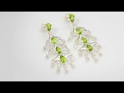 Video of Peridot Earrings Sterling Silver Pear Shape 4 Carats SE7188. Includes a Peora gift box. Free shipping, 30-day returns, authenticity guaranteed. 