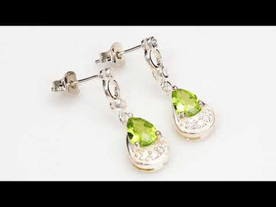 Video of Peridot Earrings Sterling Silver Pear Shape 1.5 Carats SE7142. Includes a Peora gift box. Free shipping, 30-day returns, authenticity guaranteed. 