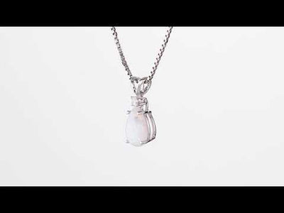 Video of  Peora 14 Karat White Gold Pear Shape Created Opal Diamond Pendant P9838. Includes a Peora gift box. Free shipping, 30-day returns, authenticity guaranteed. 