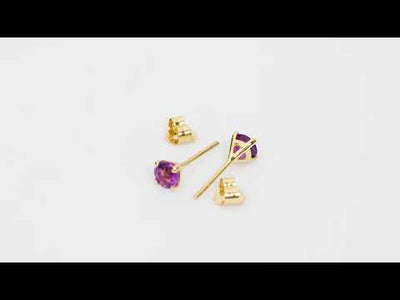 Video of  4mm Round Amethyst Solitaire Stud Earrings in 14K Yellow Gold.  Includes a Peora gift box. Free shipping, 45-day returns, authenticity guaranteed. E19330