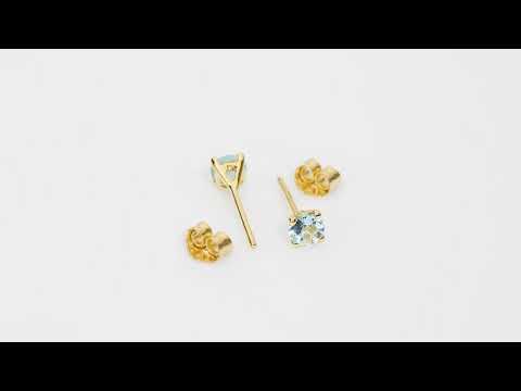 Video of 4mm Round Aquamarine Solitaire Stud Earrings in 14K Yellow Gold.  Includes a Peora gift box. Free shipping, 45-day returns, authenticity guaranteed. E19332