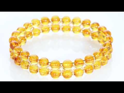 Video of Genuine Baltic Amber Tennis Stretch Bracelet, Double Row Cognac Color SB4506. Includes a Peora gift box. Free shipping, 30-day returns, authenticity guaranteed. 